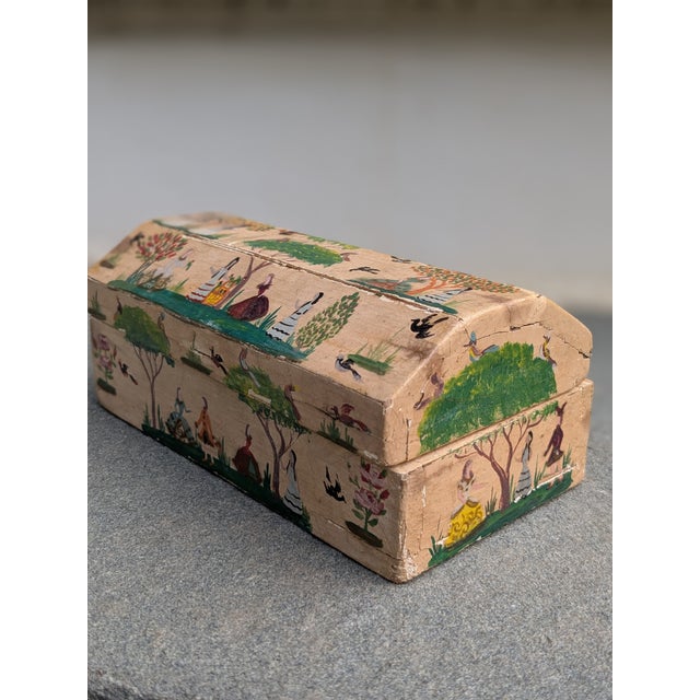 Description: Charming hand-painted folk art wood dome box by listed Mexican-American artist Salvador Corona. This small,...