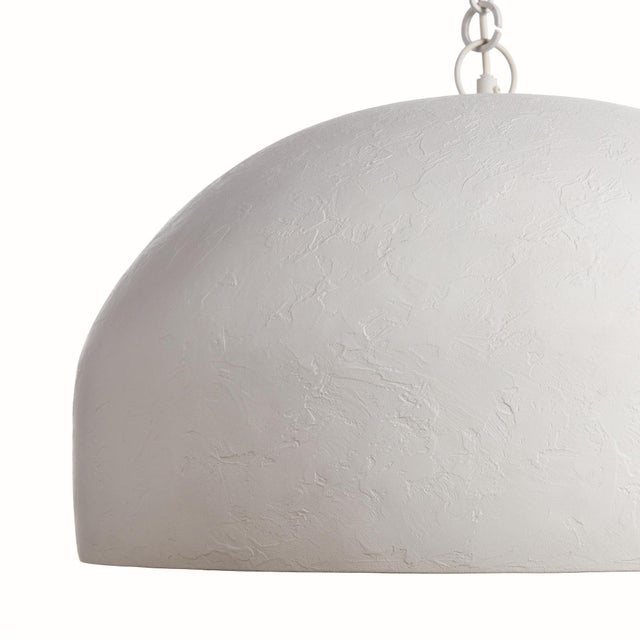 A modern statementworthy pendant with a lightly pounded textured metal dome shade. Finished in an ontrend matteWhite, this...