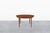 This exceptional mid-century modern dining table, crafted by Dyrlund in Denmark during the 1960s, is a masterclass in both...