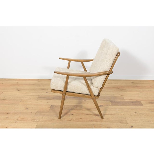 The armchair was produced by the Czechoslovak company TON in the 1960s. The beech elements have been cleaned from the old...