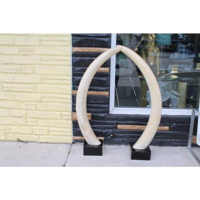Faux Elephant Tusks on Lucite Bases A Pair Chairish