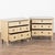 A pair of elegant Gustavian pine chests of three drawers painted in soft beige with white specks and faint yellow...