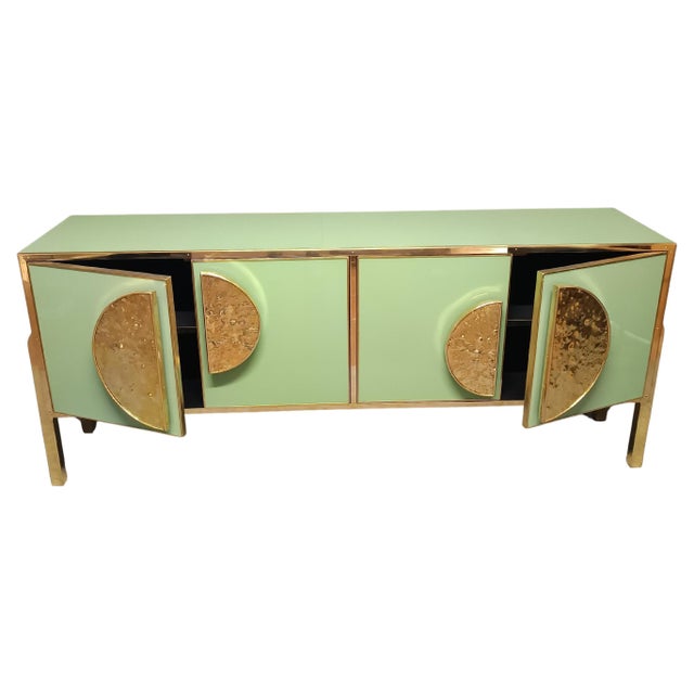 Italian Brass & Green Murano Glass Credenza – A Masterpiece of Mid-Century Italian Craftsmanship Stunning handcrafted...