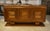 A 1940s sideboard with a solid design, in the late Art Deco/Brutalist style, with a striking architectural presence. The...