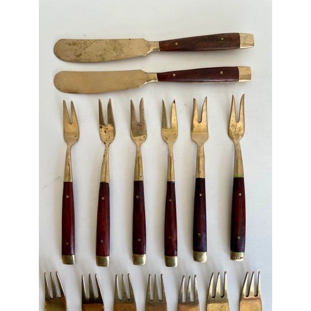 Here is a beautiful set of smaller sized appetizer utensils. They are made of brass with rosewood handles. Super...