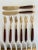 Here is a beautiful set of smaller sized appetizer utensils. They are made of brass with rosewood handles. Super...
