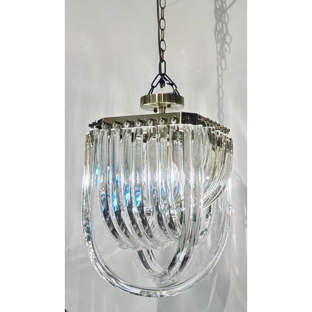 Timeless Italian Mid-Century Modern Style Glass Ribbon Chandelier, chrome frame, showroom floor sample