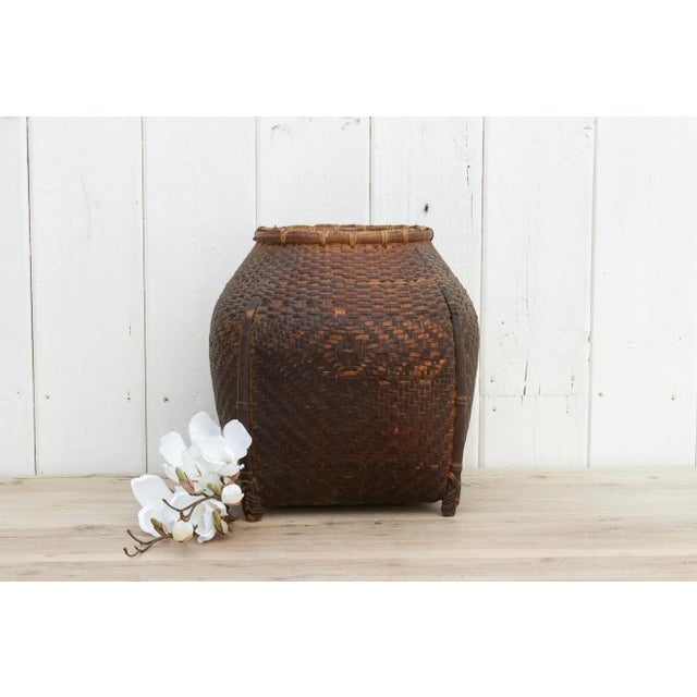 Beautiful handwoven made from bamboo and rattan. This large basket from Nepal features a double weave rounded body. This...