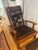 A beautifully crafted lounge chair and matching ottoman in the style of Thomas Moser Cabinetmakers, showcasing the...