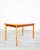 This mid-century modern Teakdining table was designed in the 1960s by Henning Kjaernulf for Velje. It comes with two...
