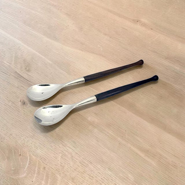 A mid-twentieth-century German two-piece serving set by Jacob Grimminger of Schwäbisch Gmünd, comprising a large serving...
