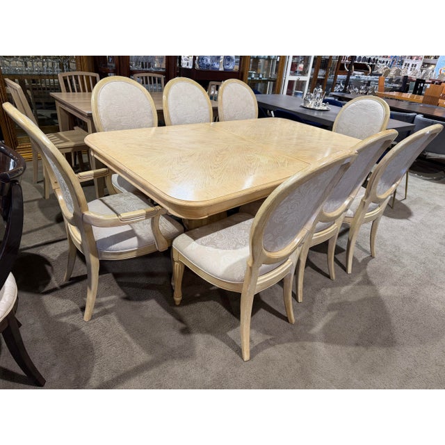 Make a statement of timeless sophistication with this Bernhardt Two Pedestal Dining Set with Eight Chairs by Bernhardt—a...