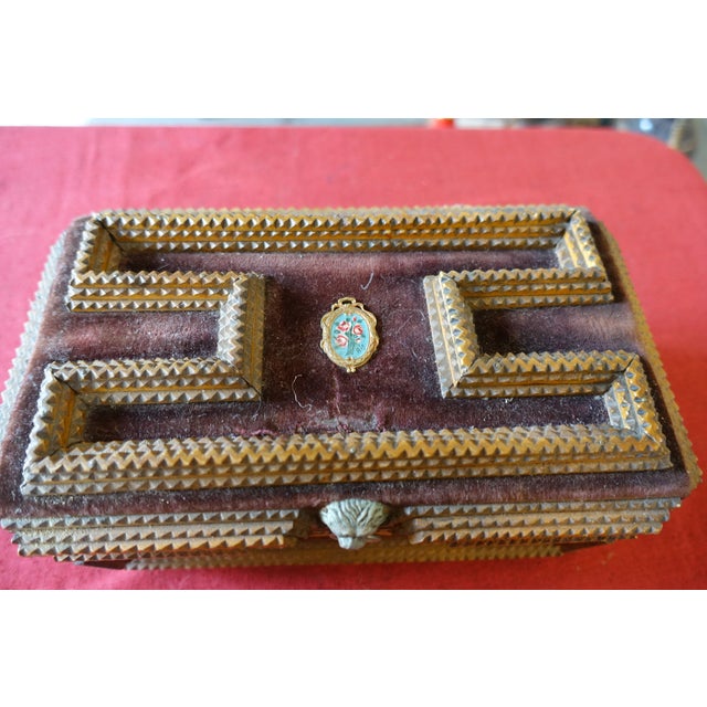 Superb example of a particularly well-crafted Tramp Art box. Probably a wedding box with portraits of the bride and groom....