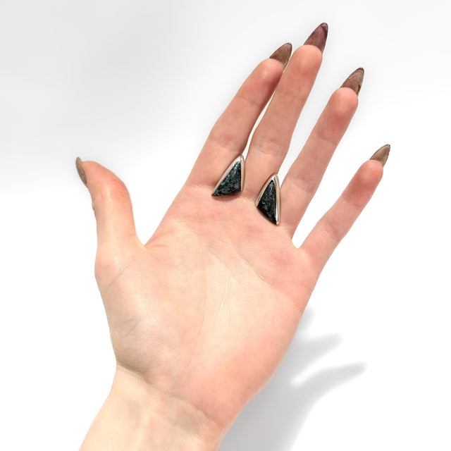 A fine pair of Mexican Mid-Century cufflinks. By H. Arriaca. In sterling silver. With bezel set azurmalachite cabochons in...