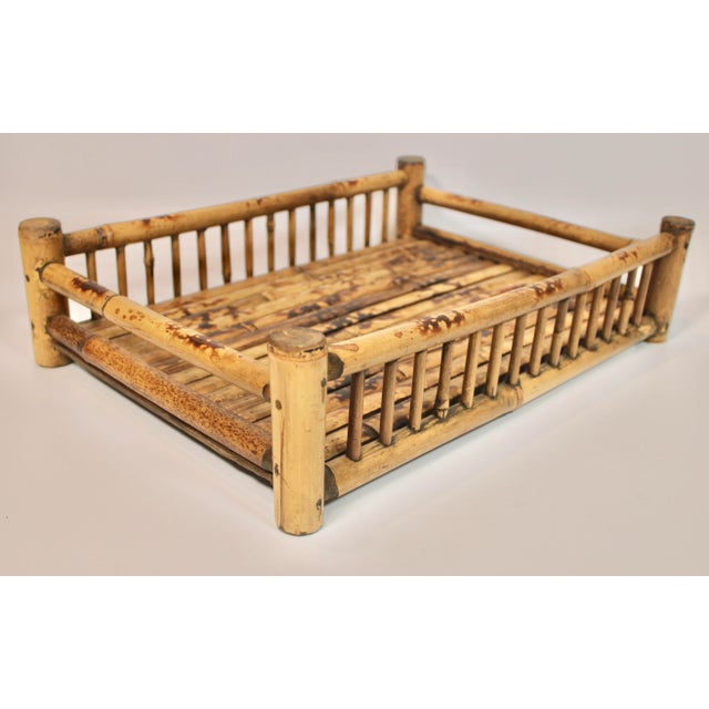 An absolutely stunning mid 20th century bamboo tray. With a lovely windowed gallery and tortoise shell motif- the form and...