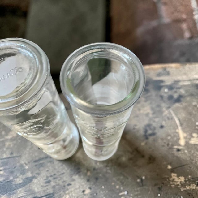Set of two embossed glass jars produced by kastrup glassworks in denmark during the mid-20th century. clear pressed glass...