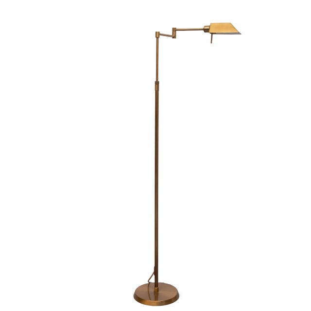 Very nice swing arm Holtkotter Library floor lamp . Brass in a Bronze Color . adjustable in Height , Halogen with a good...