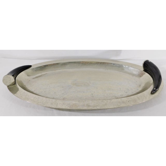 Absolutely stunning large alpaca silver tray with black horn handles. Made in Argentina - Circa 1980s. Gently used and in...
