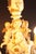 Six-arm porcelain chandelier figuratively decorated with cupid figures and richly decorated with flowers. The chandelier...