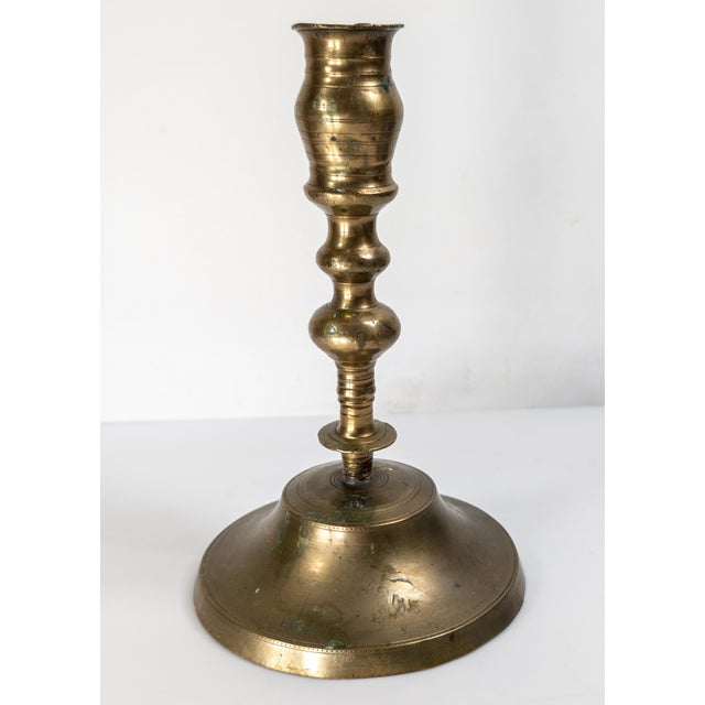 We are selling this interesting Candlestick with make do repair. We believe the top portion of this candlestick to be...