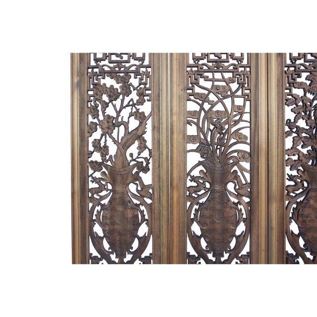 This is a set of four wooden wall decor with Chinese traditional 4 seasons flower theme surrounded by a simple geometric...