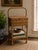 This authentic 1900s Heywood Brothers & Wakefield Co. floor-standing wicker sewing basket stand features intricate woven...
