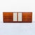 A newly refinished mid century modern oak credenza / sideboard with rattan paneling by Jack Cartwright, made by Founders...