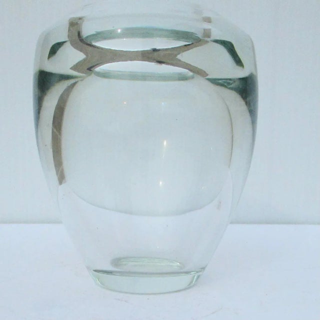 Fine crystal thick-walled vase. Very thick bottom and thick walls. This small vase is perfectly balanced to carry its load...