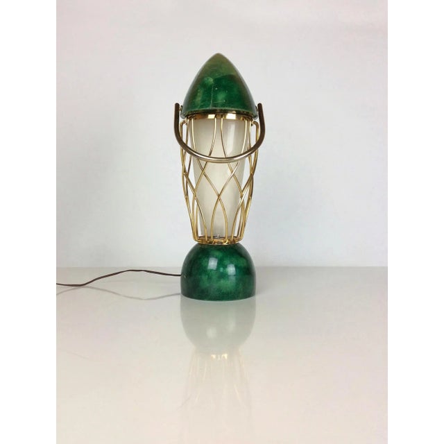 This table lamp by Aldo Tura dates to the 1950s. Labeled by Maker,This piece has an attribution mark, I am sure that it is...