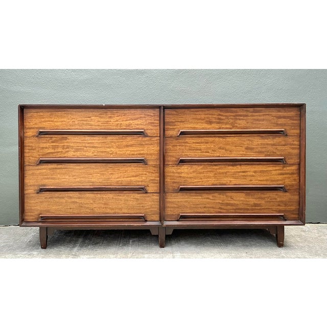 The Drexel Perspective line is a celebrated hallmark of American Mid-Century Modern design, characterized by its...