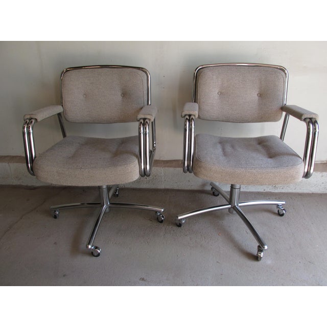 Pair 1970s Modernist tubular steel swivel armchairs by Metalstand Inc., Philadelphia. Very nicely constructed. Weighty and...