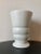 A beautiful white glazed porcelain ceramic pottery vase by Haeger, USA, circa 1930s. Vase has a banded body with...