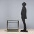Vintage metal serving trolley, smoked glass shelves with bottle holder structure. This piece is attributed to the...