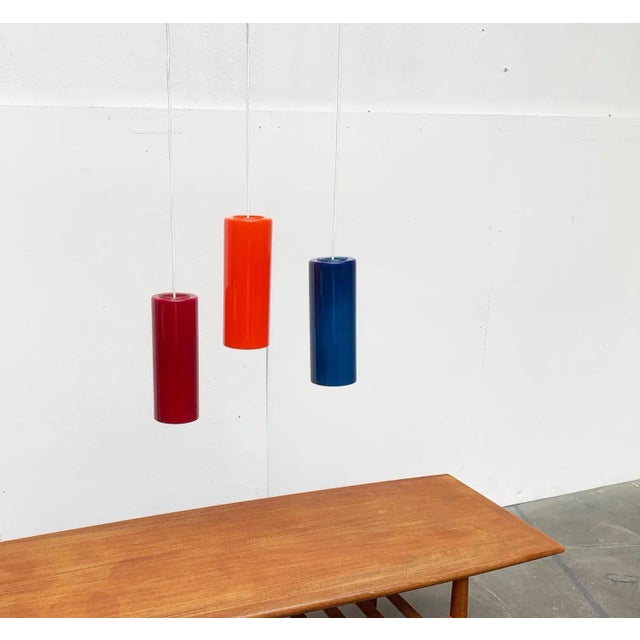 Rare Mid Century glass pendant lights in a special color scheme. The design of these Swedish lamps is attributed to Hans-...