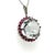 A Round Rock Crystal Round Cluster Pendant, claw set in 18ct white gold within a border of 23 round synthetic rubies. Rock...