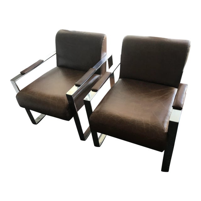 Bergman Chair Industry west (no longer available) Brown leather and polished stainless frame Leather has aged nicely PRICE...