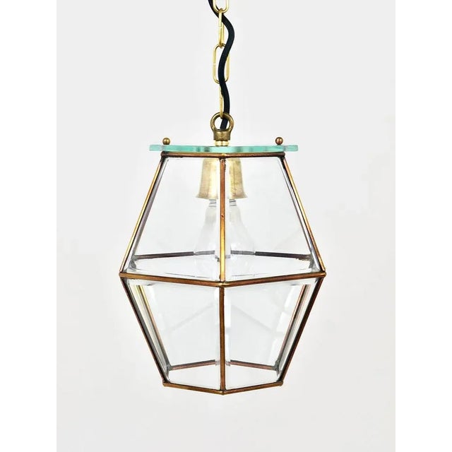 A beautiful handmade Austrian pendant light, dated circa 1900 in the manner of Adolf Loos. Made of brass and facetted...