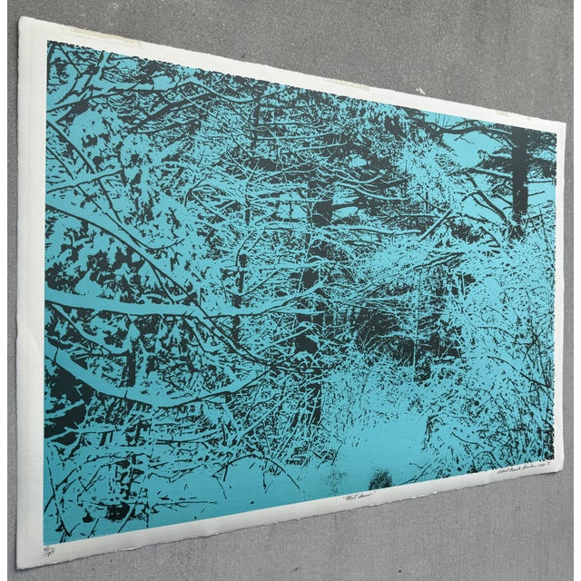 The print in the image is titled "Wet Snow" by the 20th-century American artist Albert Frank Quinlan, created in 1975. It...