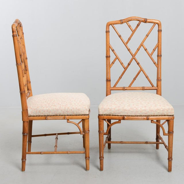 Elegant pair of faux-bamboo dining chairs in classic Hollywood regency manner, probably dated back to ca 1970 in great...