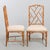 Elegant pair of faux-bamboo dining chairs in classic Hollywood regency manner, probably dated back to ca 1970 in great...