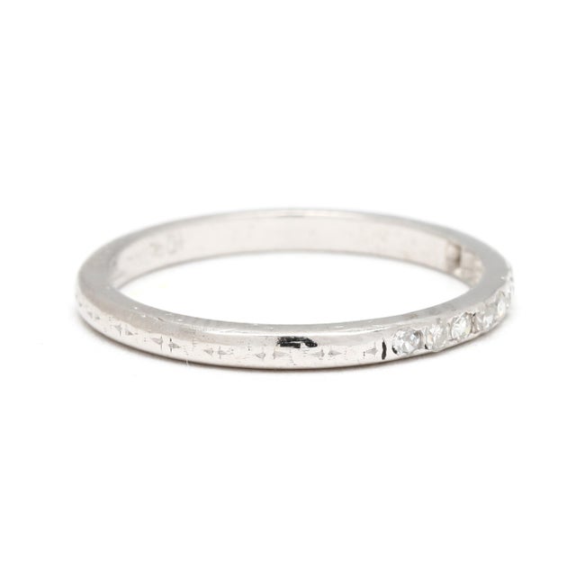 Stones: diamond, 10 single cut 1.5 mm approximately .10 total carats GH color/ VS2-SI2 clarity Ring Size 5.5 Rise Off Of...