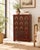 A tall, narrow chest in deep red paint, with eleven drawers that look like a little archive. Nine small drawers sit in a...