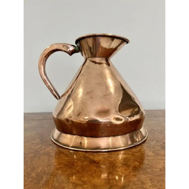 Quality George III Loftus of Oxford Street London copper one gallon jug having a shaped handle standing on a circular base
