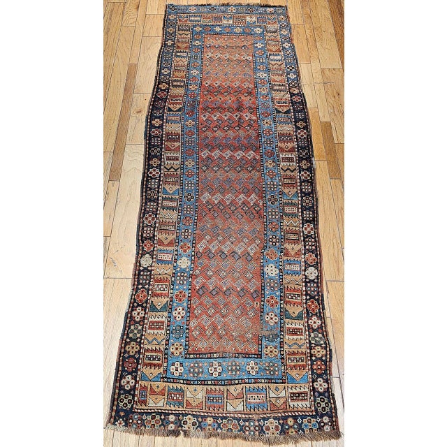 "Magnificent Late 19th Century Antique Persian Kurdish Wide Runner, meticulously hand-knotted in the late 1800s....