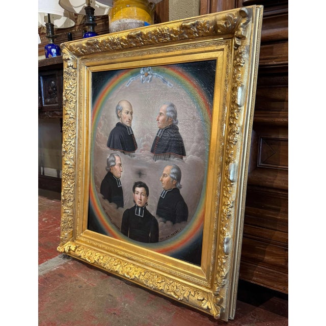 An unusual and historically evocative work of religious portraiture, this antique oil painting depicts five members of a...