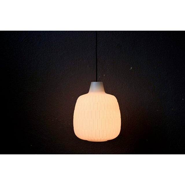 A true gem of 1960s German design, this pendant light by Aloys Gangkofner for Peill & Putzler is nothing short of elegant....