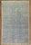 an early 20th Century Persian Tarbiz l room size rug with a blue ground Measures: 8' x 12'5''