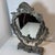 This item is a vintage Italian silver-plated tabletop vanity mirror featuring a Rococo or Baroque style with cherub...