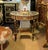 A sophisticated French Louis XVI-inspired coffee table combining rich wood craftsmanship with an elegant marble top and...