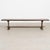 Early 20th century French bench with a simple trestle base and clean, understated lines. The chestnut wood has developed a...
